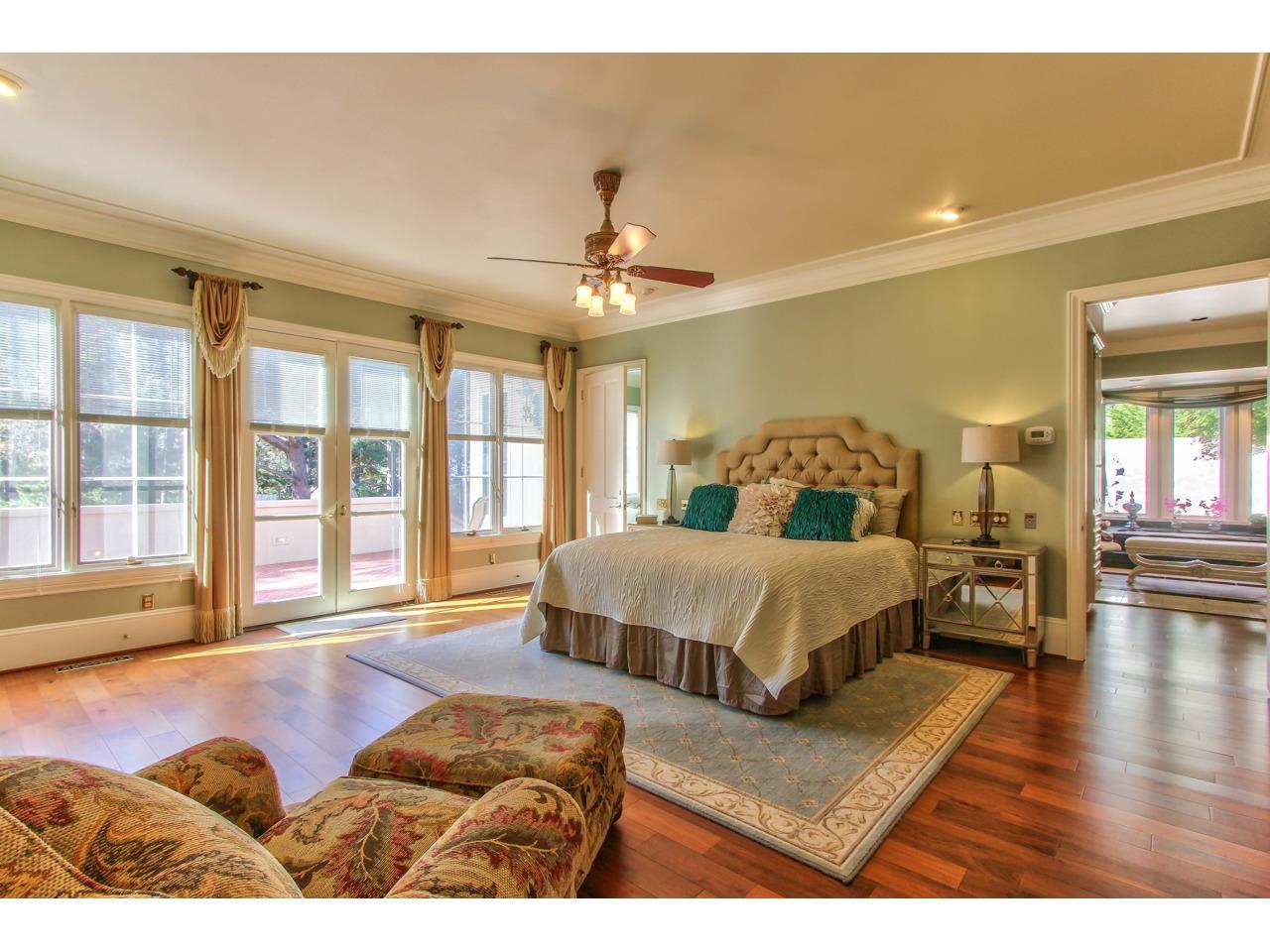 3140 Spruance Road Pebble Beach, CA 93953 - Photo 29 of 70 a bedroom with a large bed and a large window