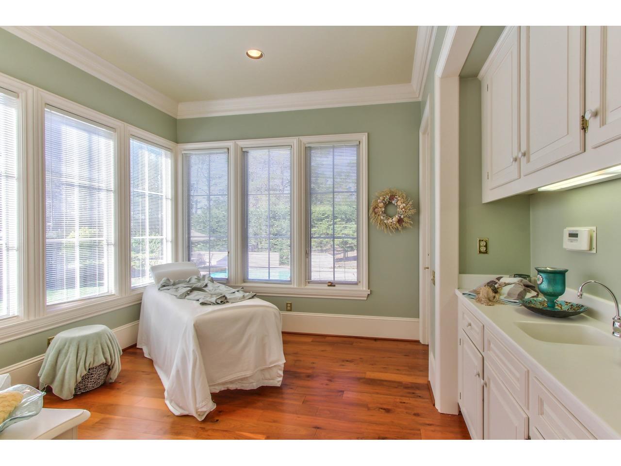 3140 Spruance Road Pebble Beach, CA 93953 - Photo 32 of 70 a bedroom with a bed and windows
