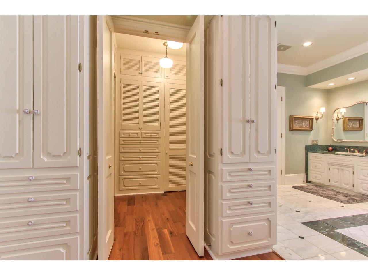3140 Spruance Road Pebble Beach, CA 93953 - Photo 35 of 70 a view of walk in closet with chandelier