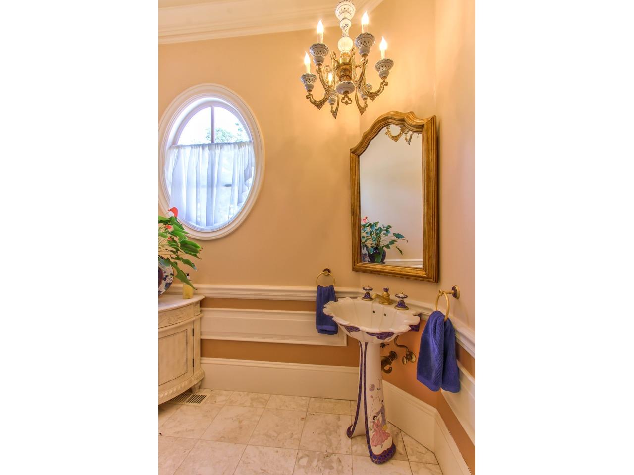 3140 Spruance Road Pebble Beach, CA 93953 - Photo 38 of 70 a bathroom with a sink and a mirror