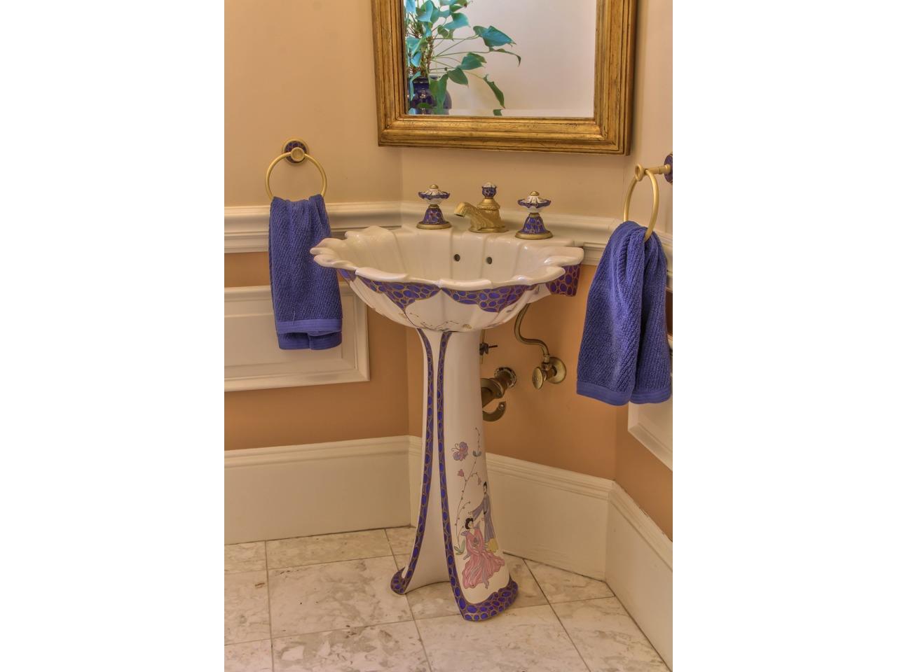 3140 Spruance Road Pebble Beach, CA 93953 - Photo 39 of 70 a bathroom with a sink and a mirror