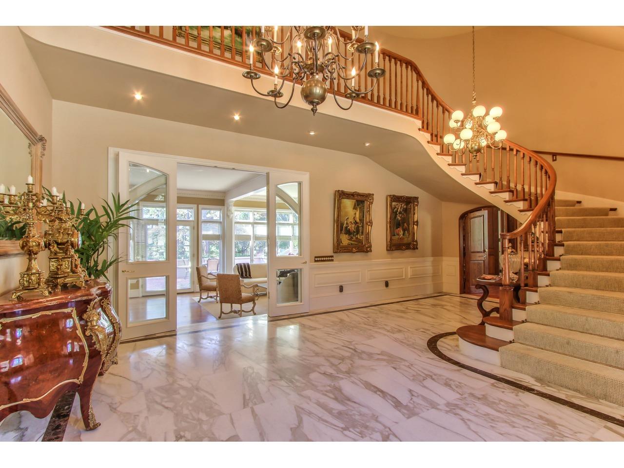 3140 Spruance Road Pebble Beach, CA 93953 - Photo 5 of 70 a living room with furniture flowerpot and a chandelier