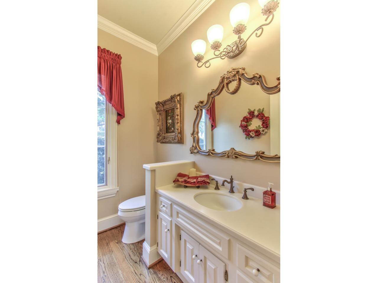 3140 Spruance Road Pebble Beach, CA 93953 - Photo 41 of 70 a bathroom with a sink vanity granite and toilet