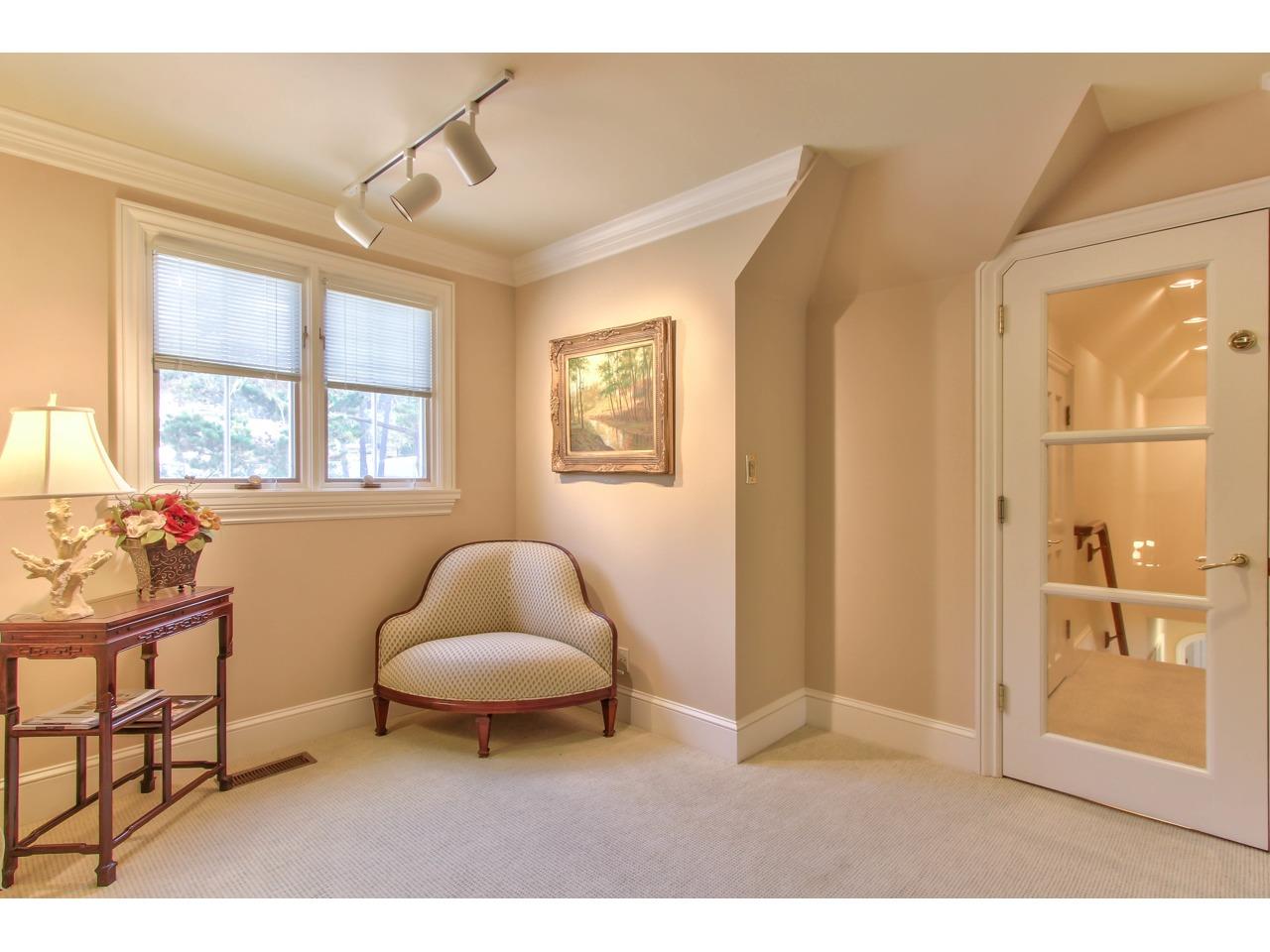3140 Spruance Road Pebble Beach, CA 93953 - Photo 43 of 70 a living room with furniture and a window