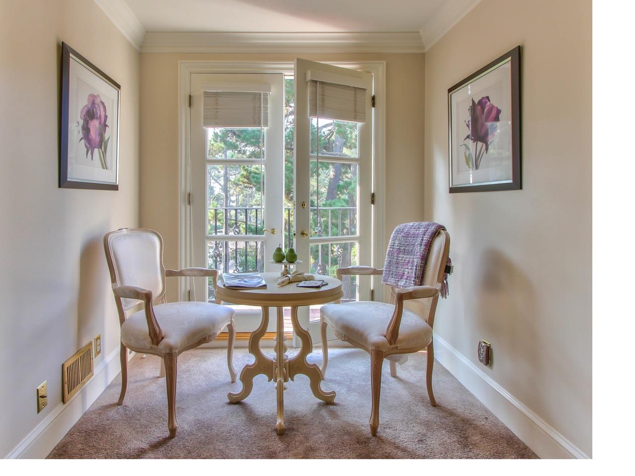 3140 Spruance Road Pebble Beach, CA 93953 - Photo 57 of 70 a view of a livingroom with furniture wooden floor and a window