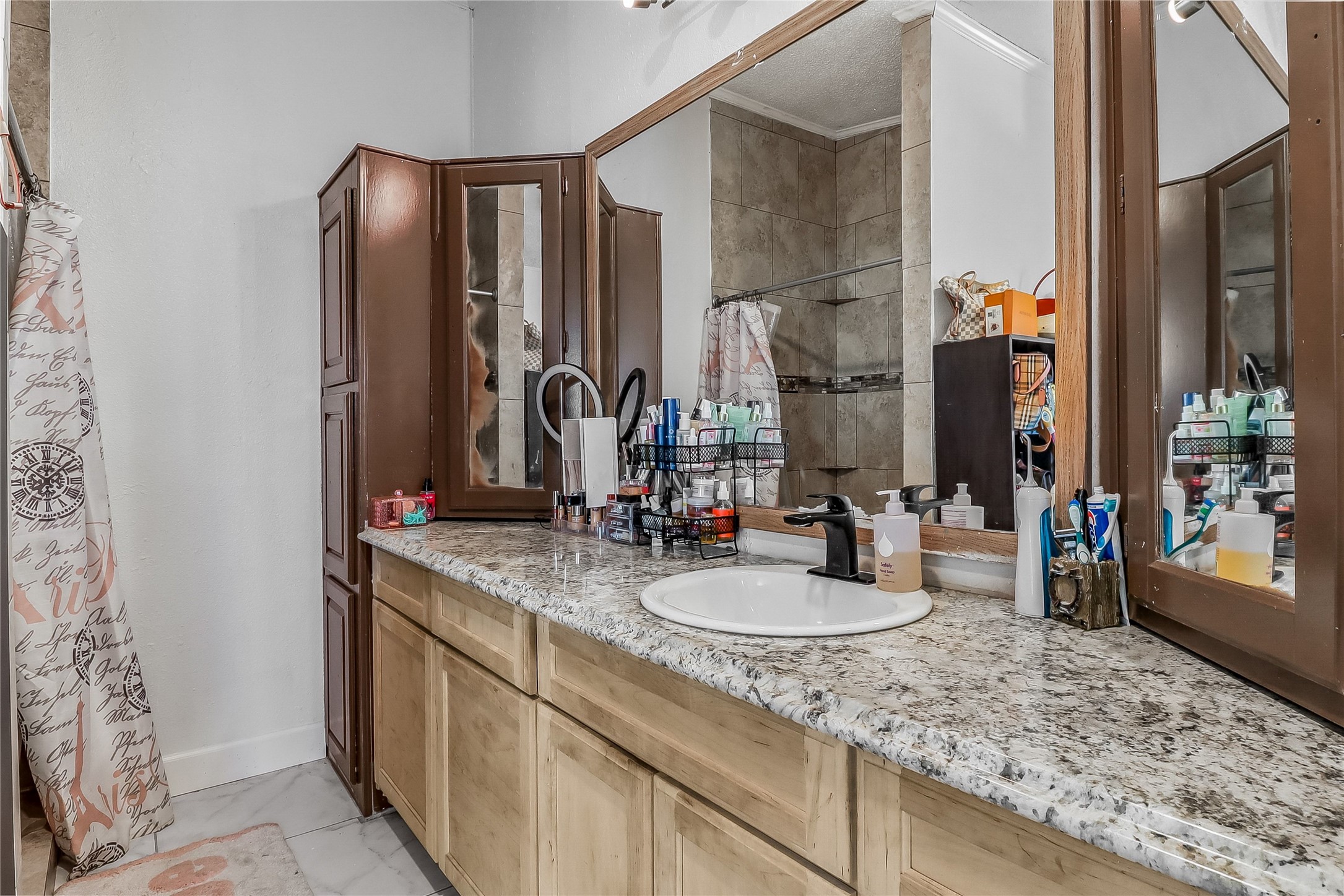 Tbd Giese Lane Elgin, TX 78621 - Photo 17 of 34 a bathroom with sink and mirror