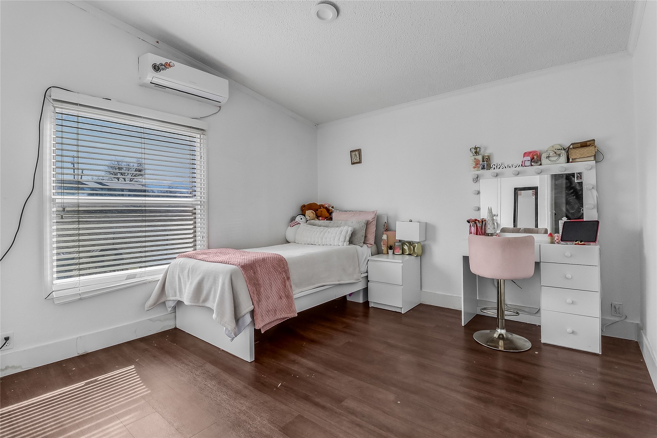 Tbd Giese Lane Elgin, TX 78621 - Photo 19 of 34 a bedroom with a bed and wooden floor