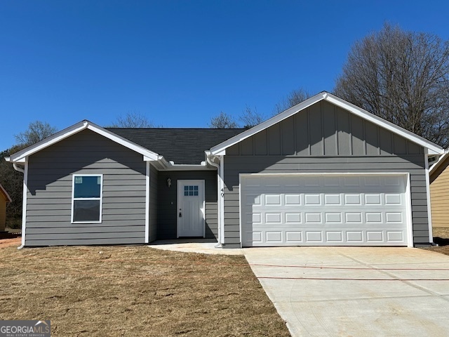 81 Adaline Court Carnesville, GA 30521 - Photo 1 of 1 a front view of a house with a garage