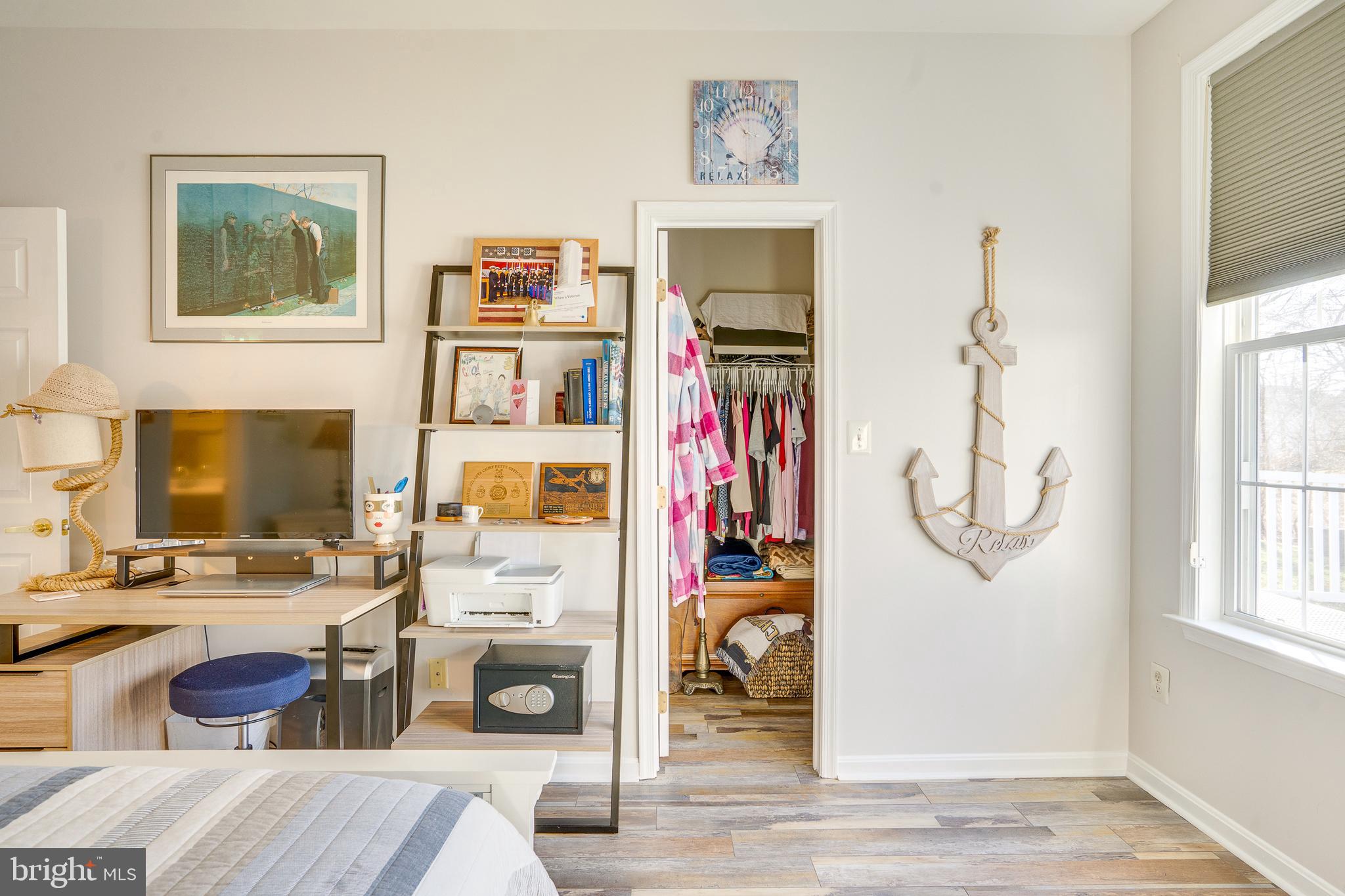 6902 Walnut Hill Drive Gainesville, VA 20155 - Photo 23 of 41 a view of a livingroom with furniture and a flat screen tv
