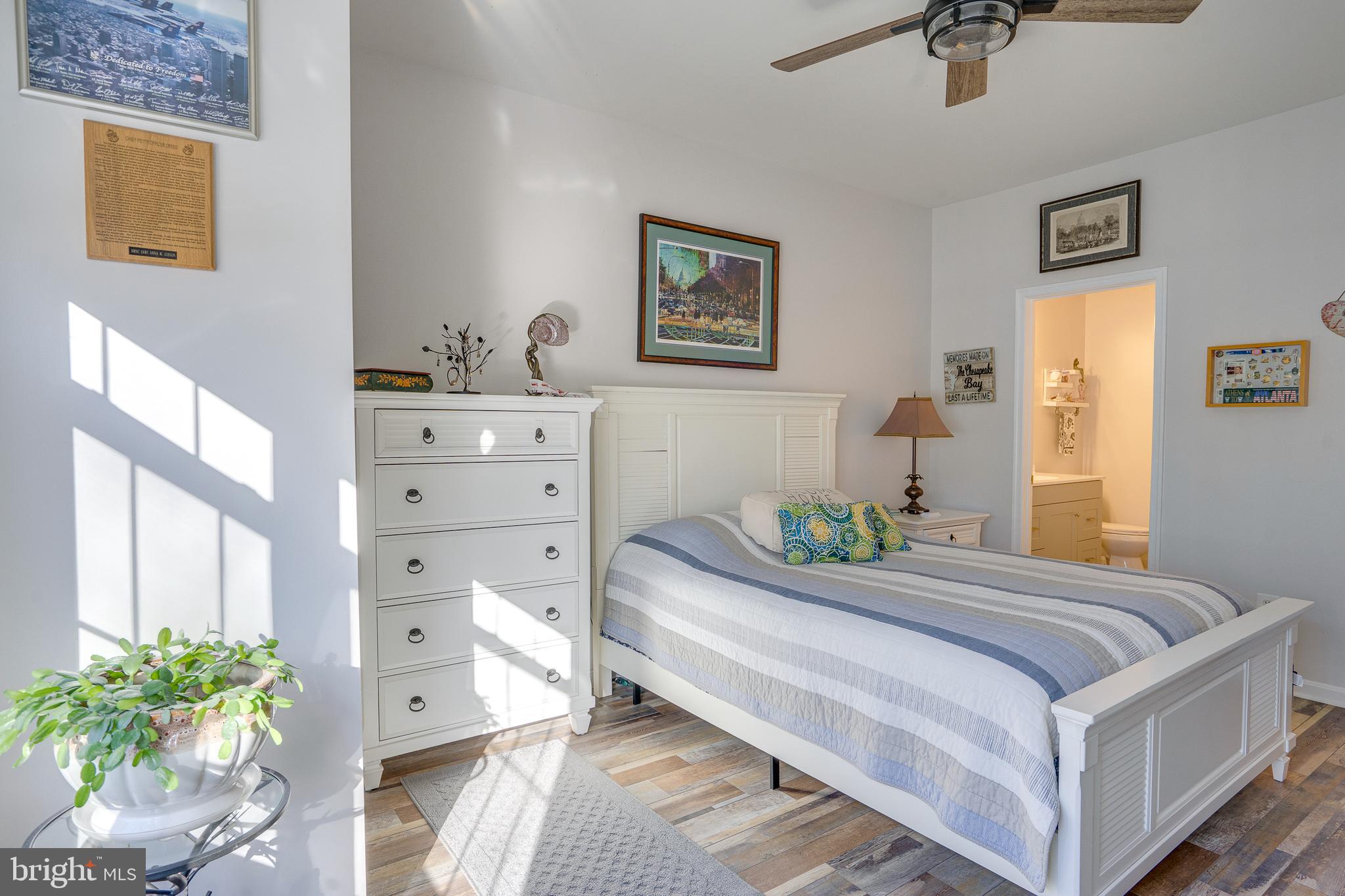 6902 Walnut Hill Drive Gainesville, VA 20155 - Photo 24 of 41 a bedroom with a bed and a dresser