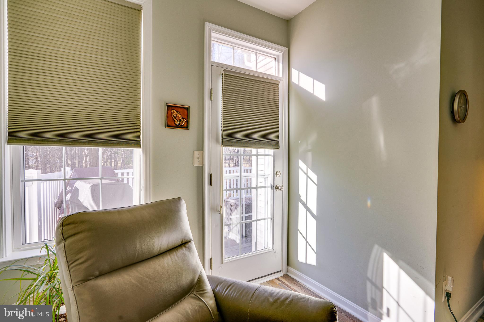 6902 Walnut Hill Drive Gainesville, VA 20155 - Photo 26 of 41 a living room with furniture and a window