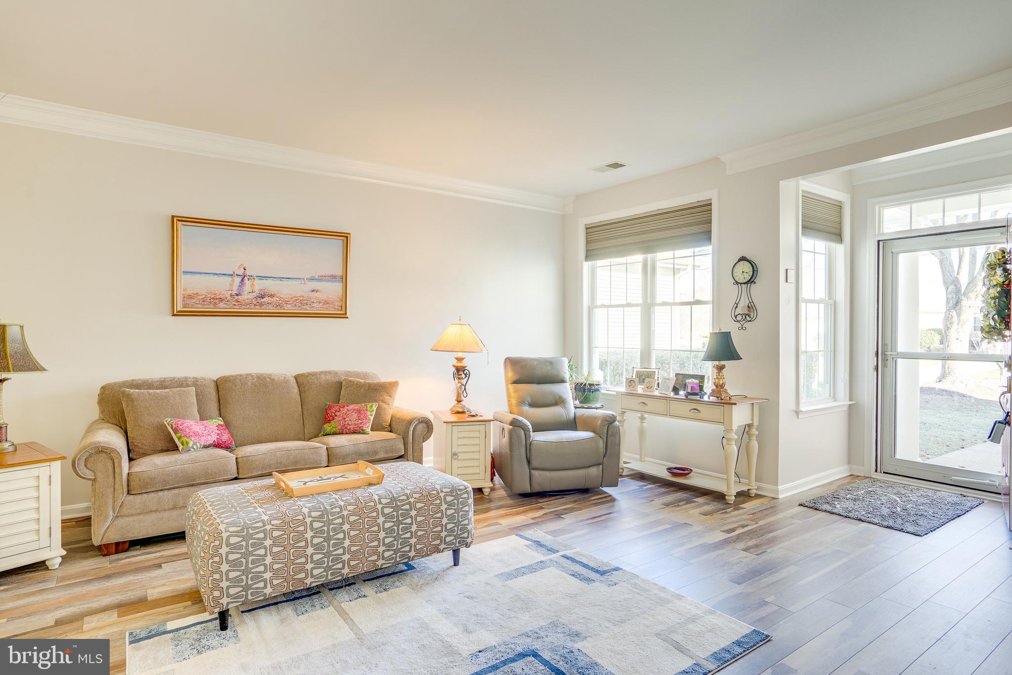 6902 Walnut Hill Drive Gainesville, VA 20155 - Photo 3 of 41 a living room with furniture and a window