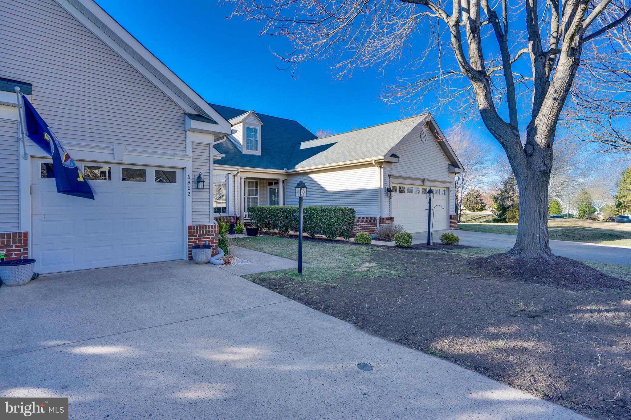 6902 Walnut Hill Drive Gainesville, VA 20155 - Photo 38 of 41 a view of a house with a yard