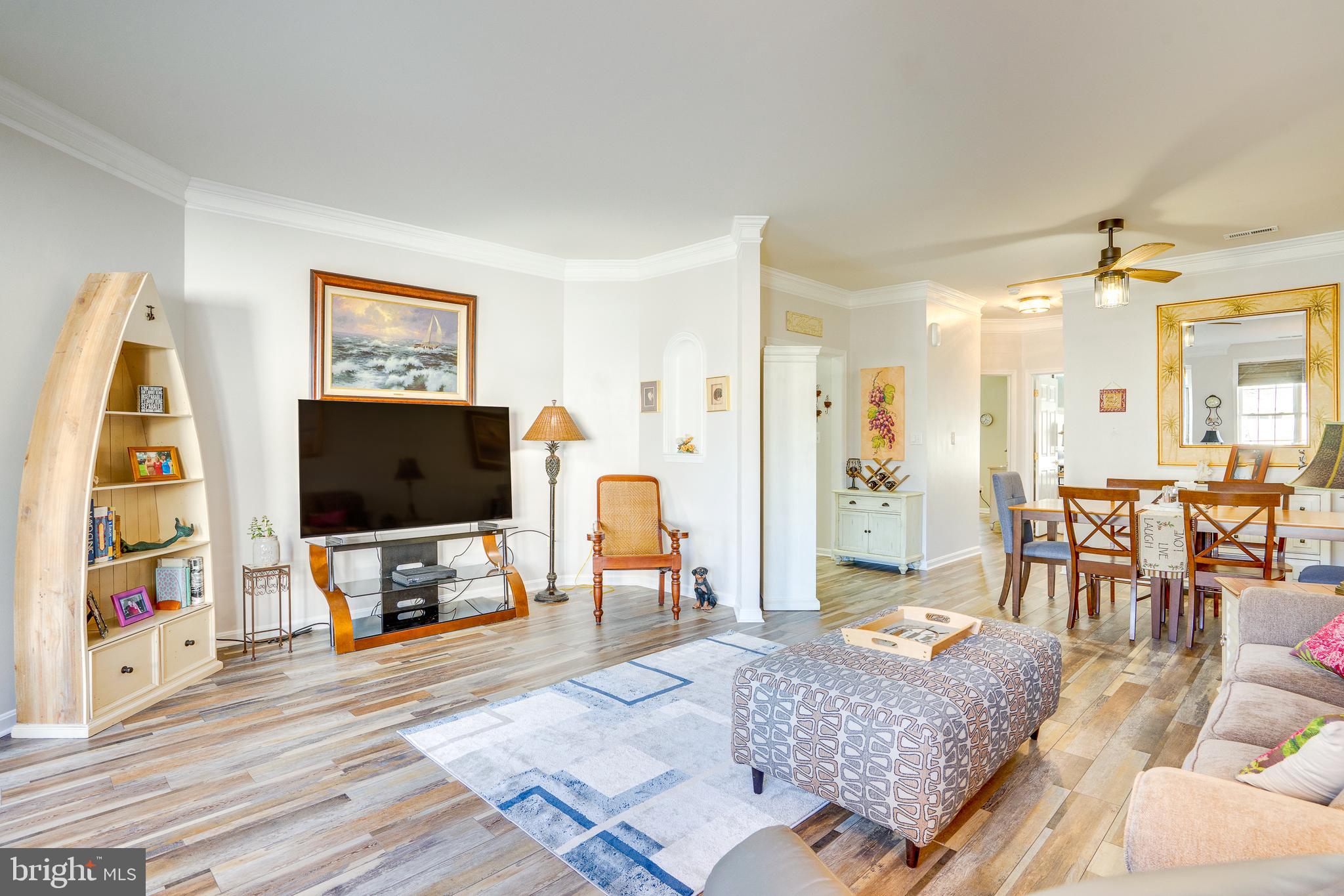 6902 Walnut Hill Drive Gainesville, VA 20155 - Photo 6 of 41 a living room with furniture and a flat screen tv