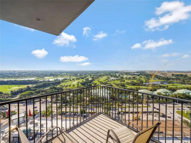 a view of city with ocean