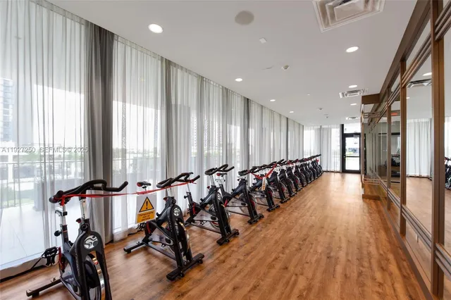 a view of a room with lots of wooden floor