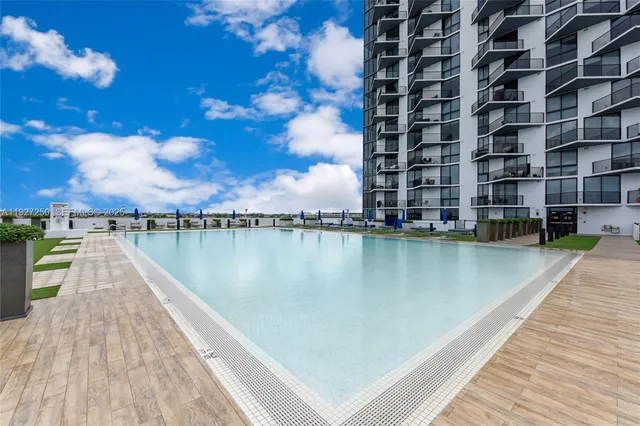 a view of building with lake