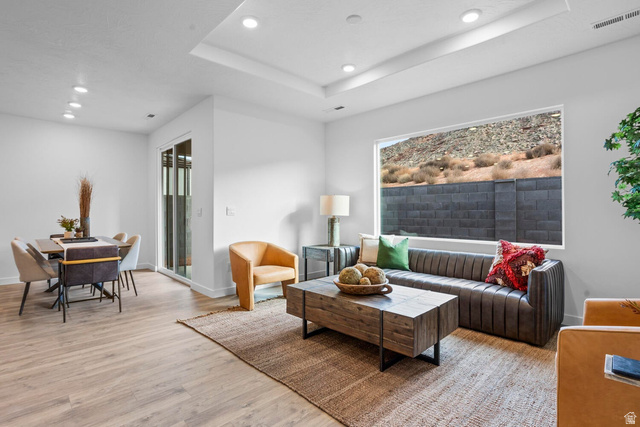 1624 South Staircase Way, Unit 4183 Washington, UT 84780 - Photo 14 of 47 Open-concept living space with wood-finish flooring, a tray ceiling, and recessed lighting