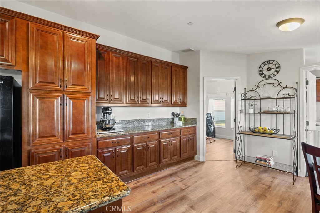 19350 Timbercove Drive Corning, CA 96021 - Photo 14 of 60 a kitchen with stainless steel appliances granite countertop a refrigerator and cabinets