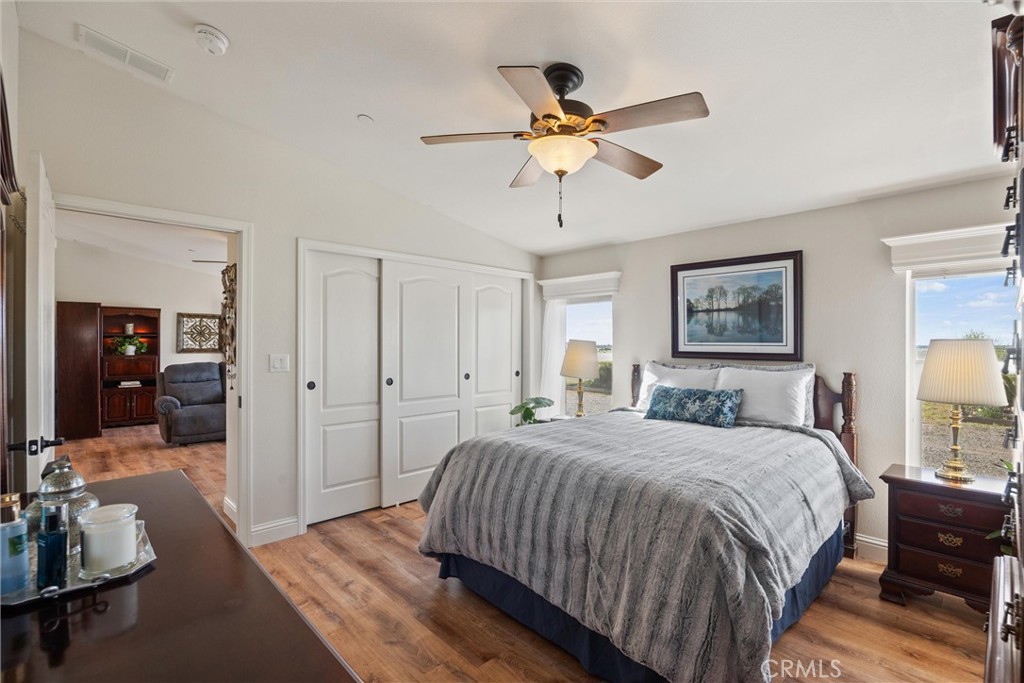 19350 Timbercove Drive Corning, CA 96021 - Photo 23 of 60 a bedroom with a bed and wooden floor