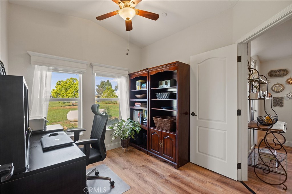19350 Timbercove Drive Corning, CA 96021 - Photo 30 of 60 a view of a workspace with furniture and a window