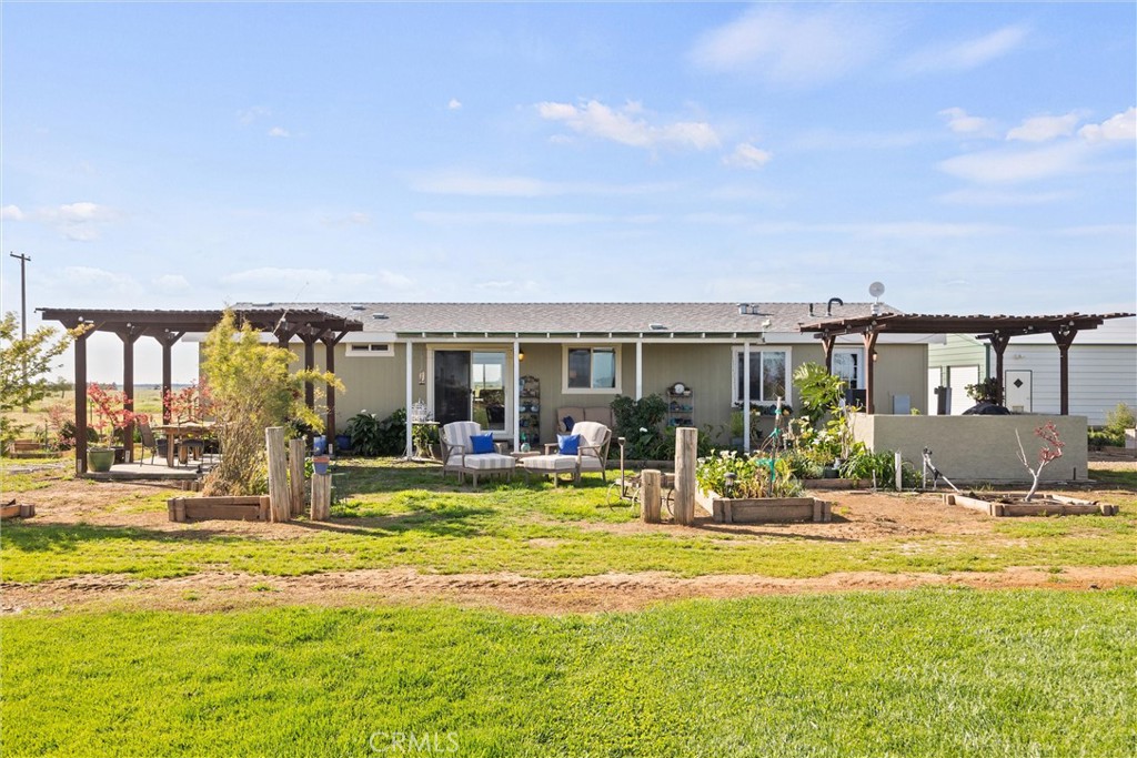 19350 Timbercove Drive Corning, CA 96021 - Photo 34 of 60 a view of a swimming pool with an outdoor seating
