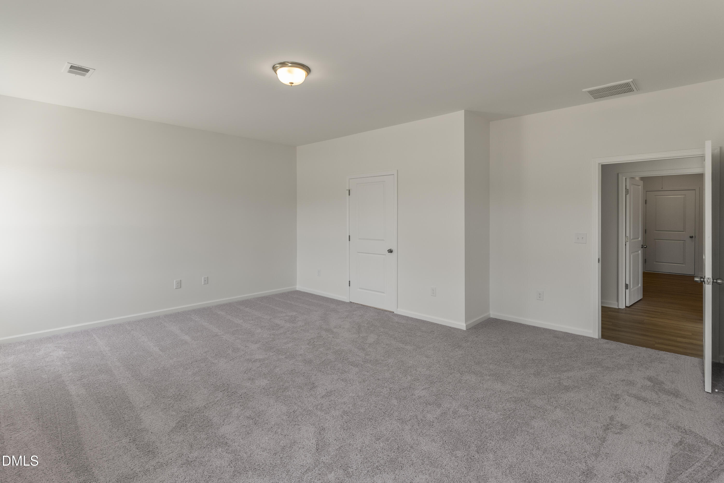 243 Spirit Spgs Road Smithfield, NC 27577 - Photo 11 of 20 a view of an empty room