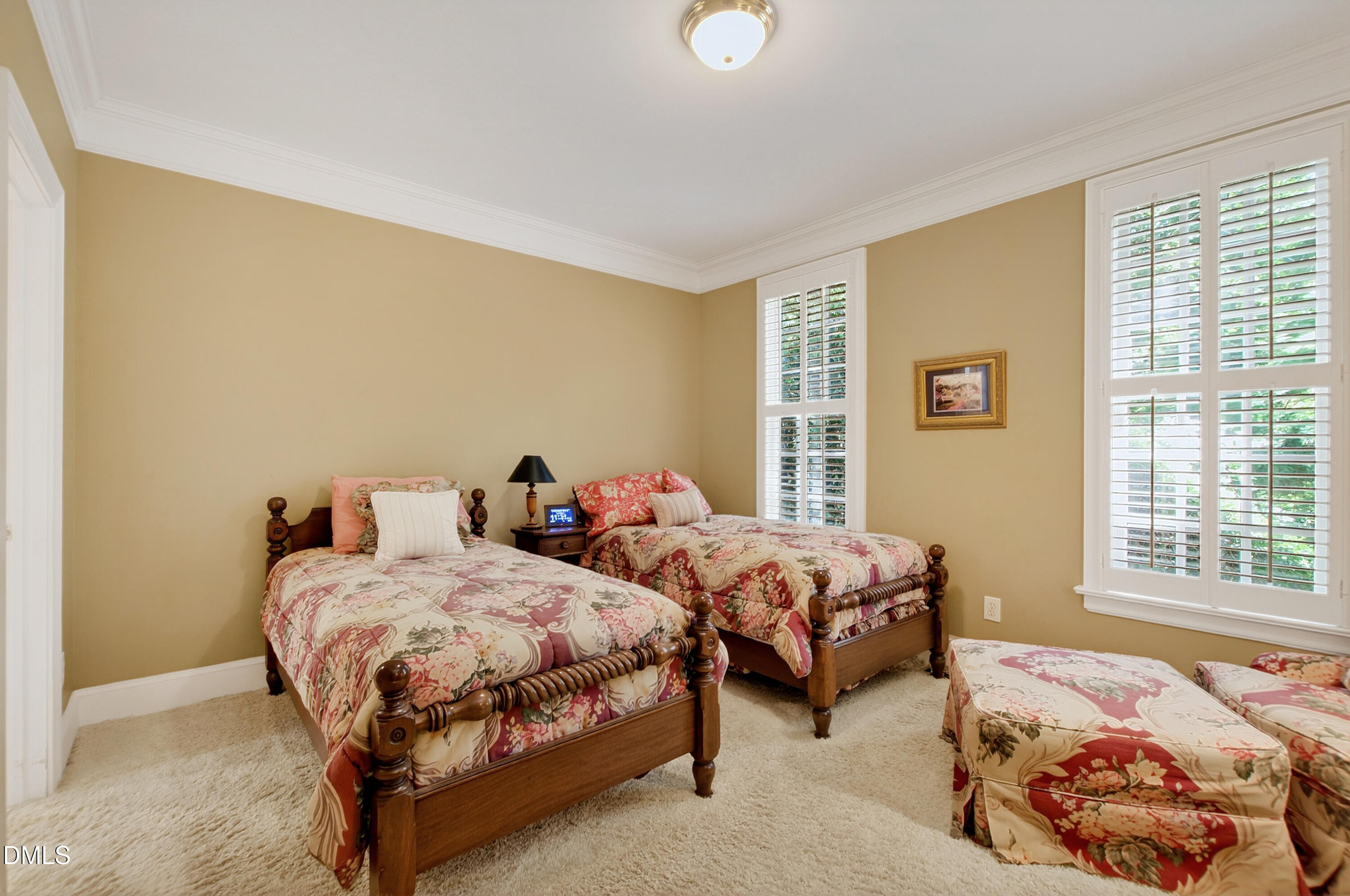 3708 Lubbock Drive Raleigh, NC 27612 - Photo 28 of 64 a bedroom with two beds and a window