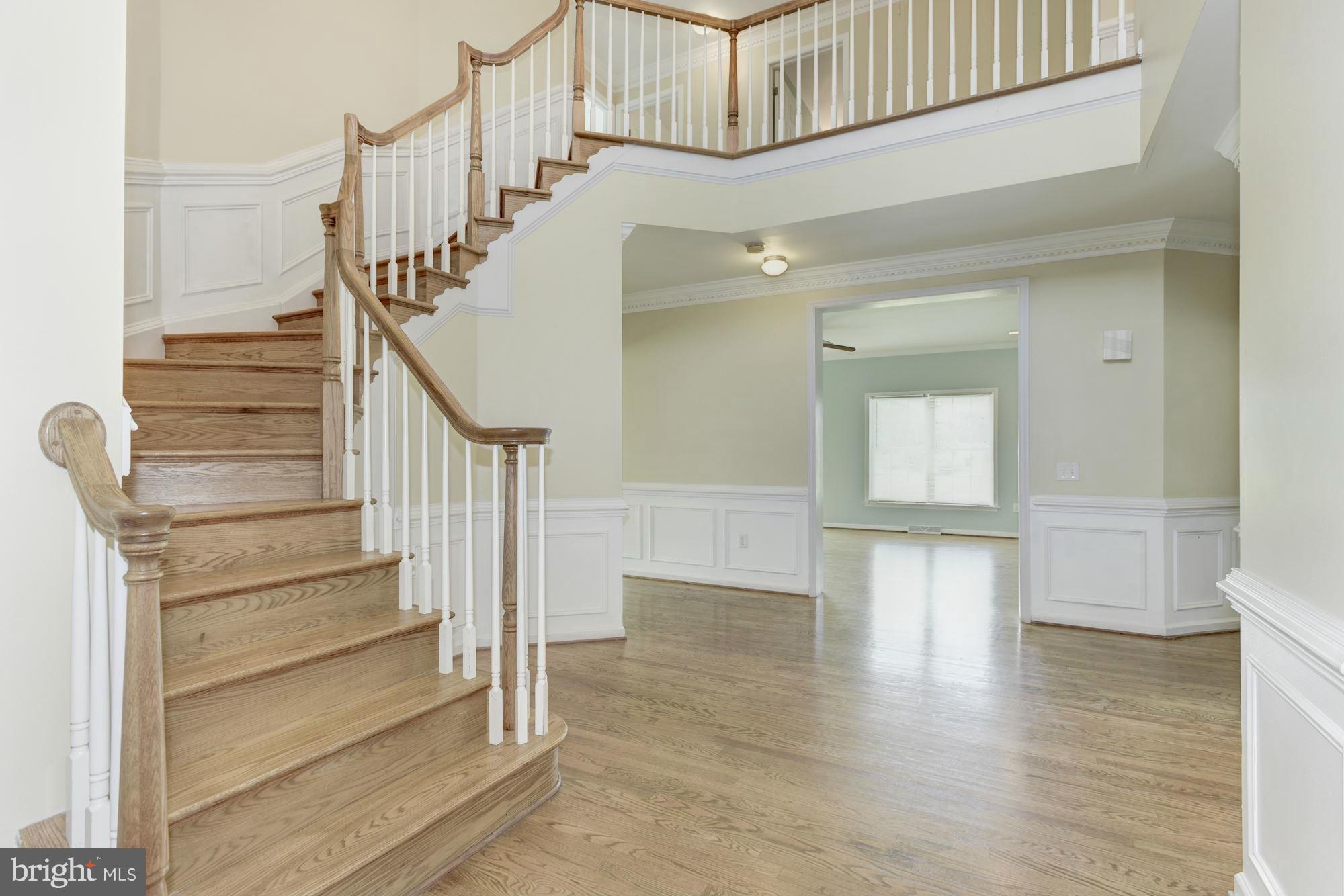 39991 Braddock Road Aldie, VA 20105 - Photo 5 of 30 Curved Staircase to Upper LVL Balcony