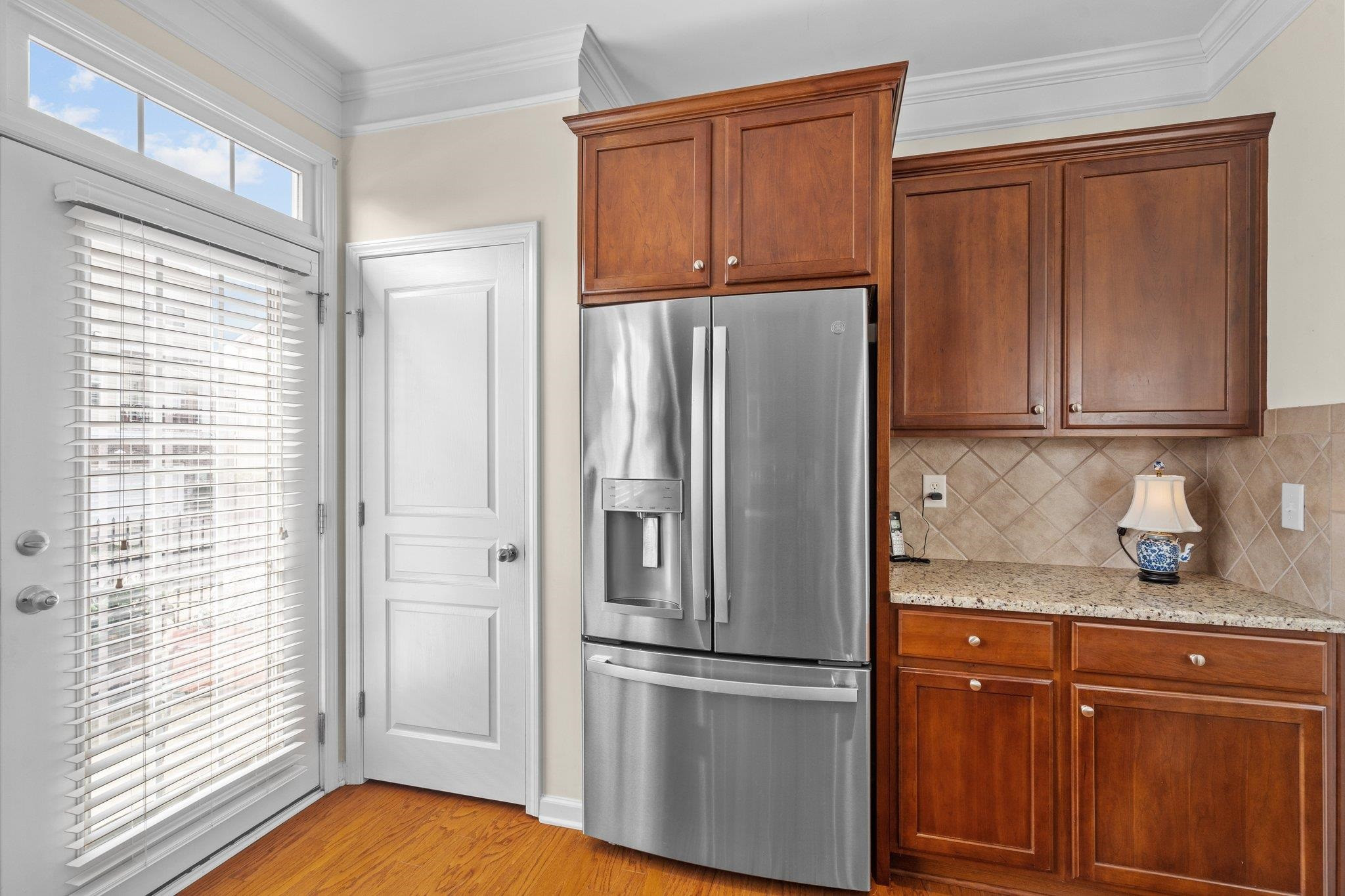 10109 Falls Meadow Court Raleigh, NC 27617 - Photo 14 of 37 a kitchen with stainless steel appliances granite countertop a refrigerator and a stove top oven