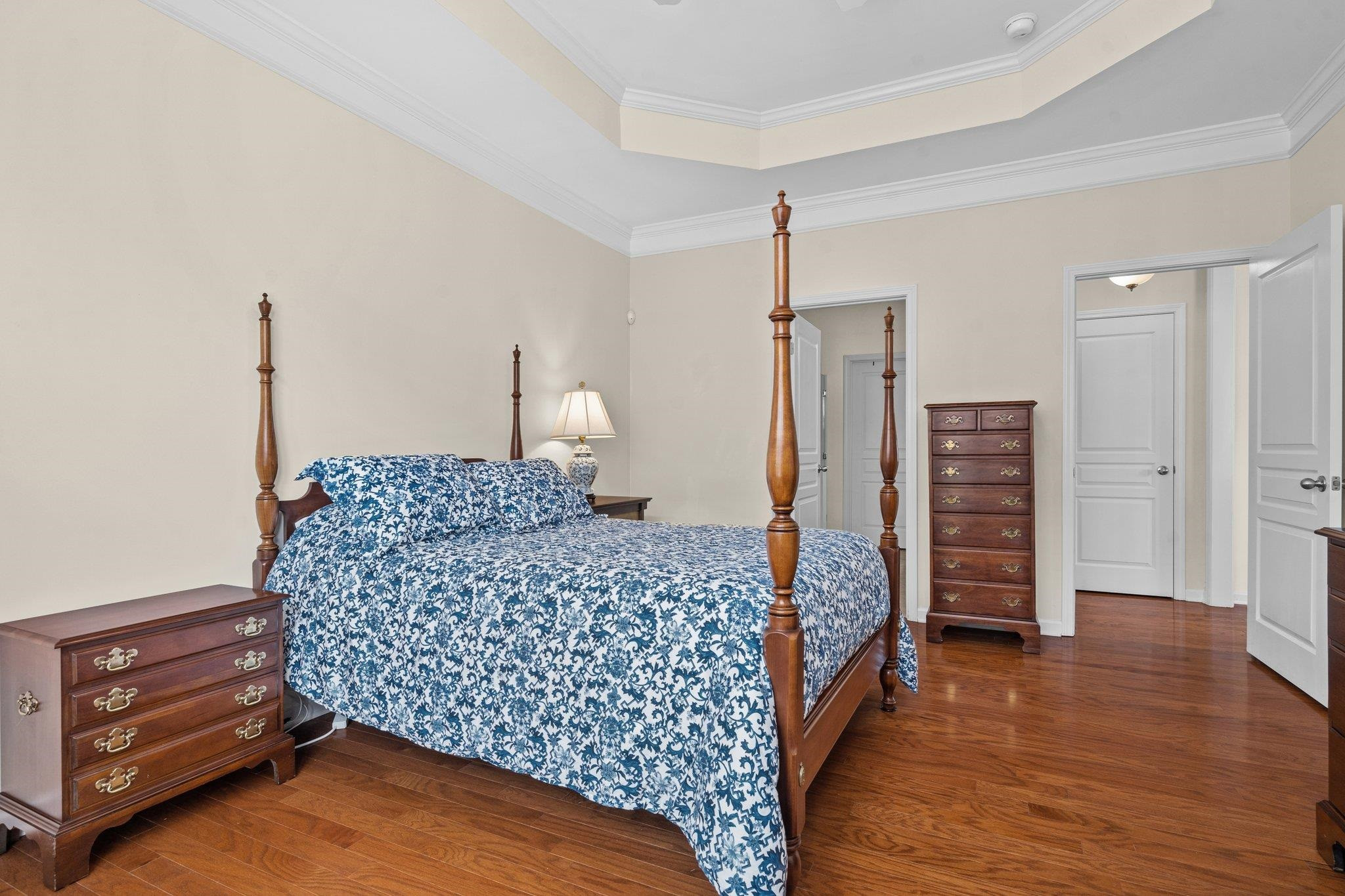 10109 Falls Meadow Court Raleigh, NC 27617 - Photo 16 of 37 a room with a bed and cabinets