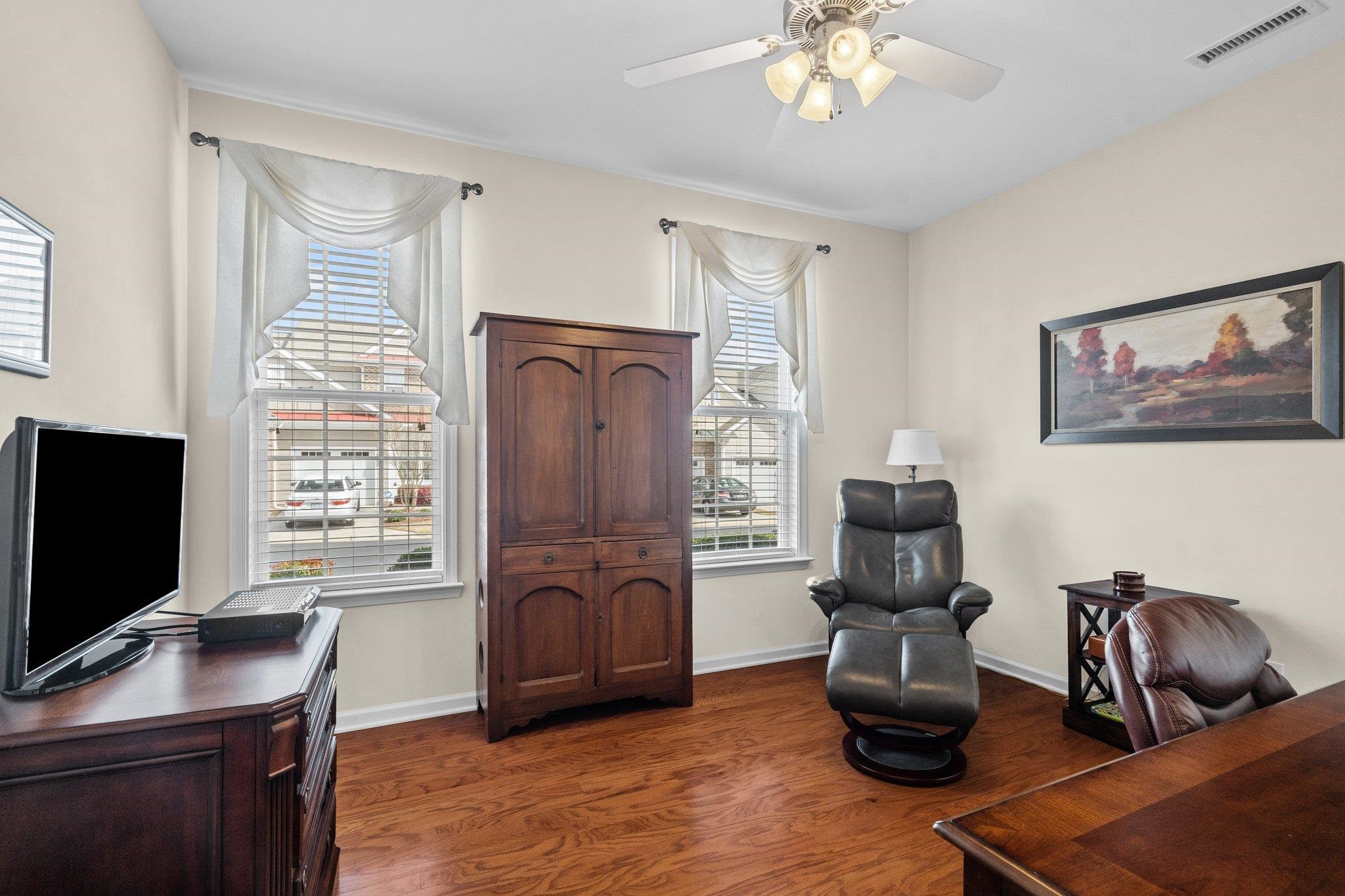 10109 Falls Meadow Court Raleigh, NC 27617 - Photo 20 of 37 a view of a livingroom with workspace and a window