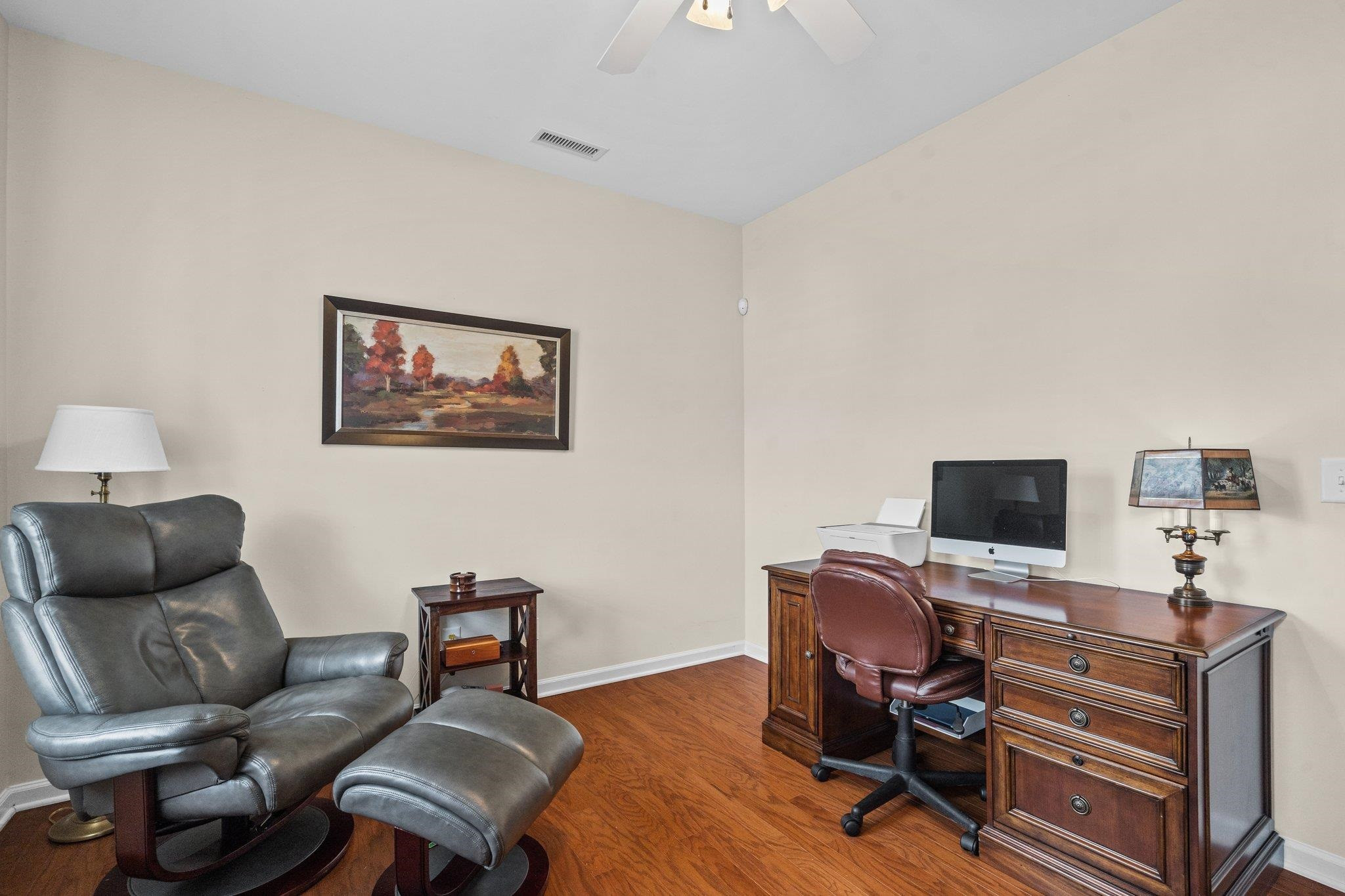 10109 Falls Meadow Court Raleigh, NC 27617 - Photo 21 of 37 a livingroom with workspace and a couch