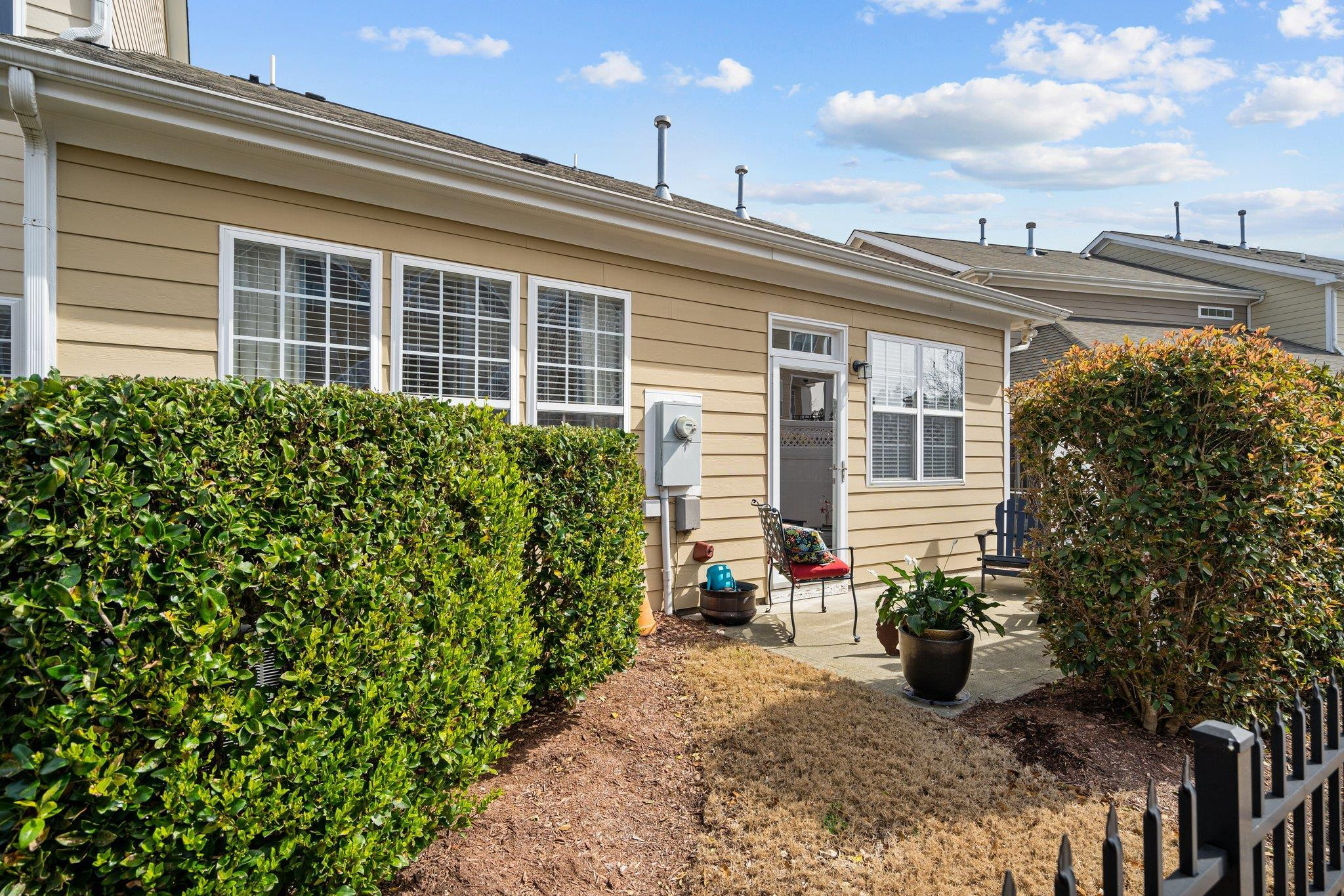 10109 Falls Meadow Court Raleigh, NC 27617 - Photo 31 of 37 a view of a house with potted plants