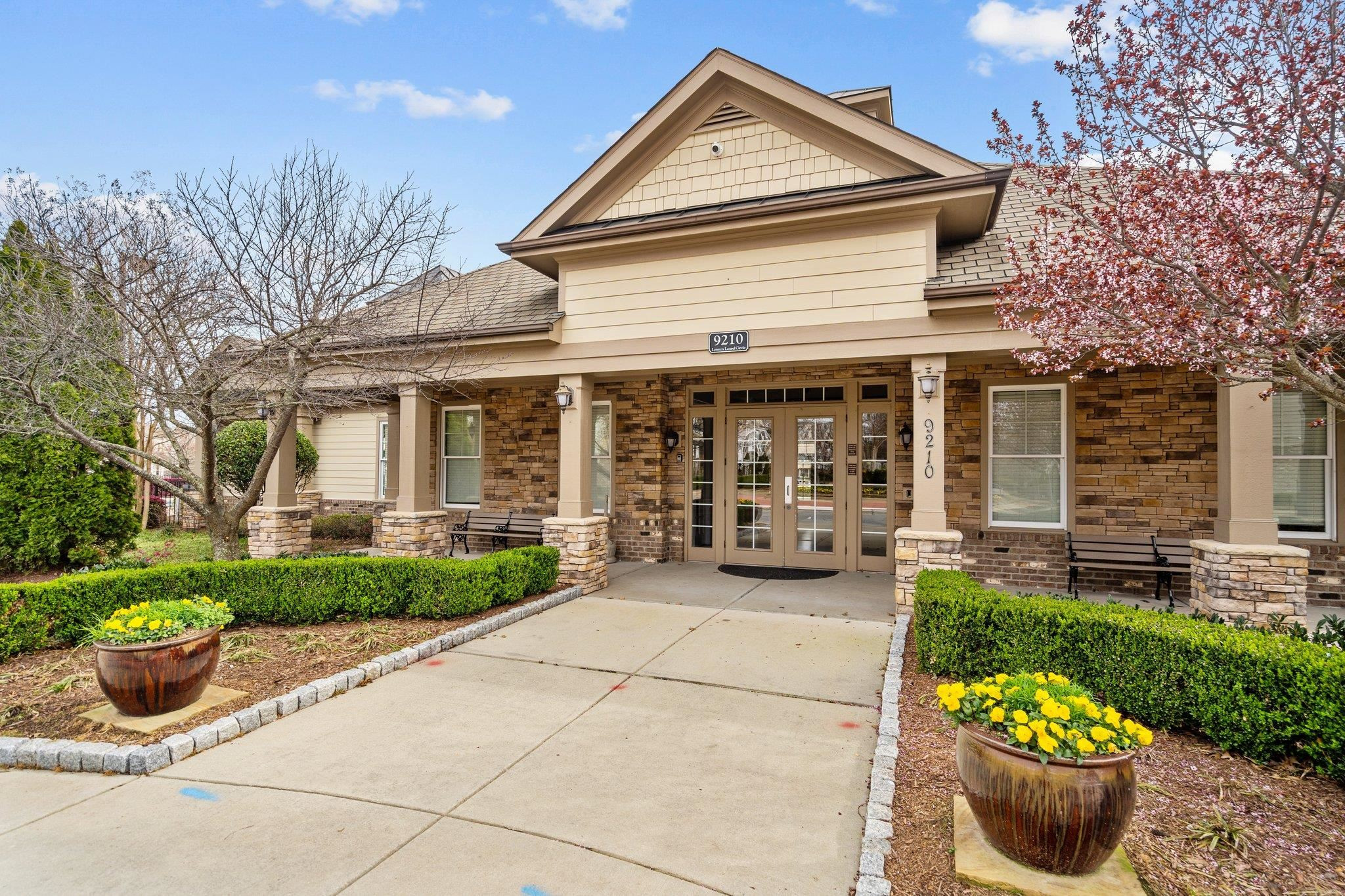 10109 Falls Meadow Court Raleigh, NC 27617 - Photo 33 of 37 a front view of a house with garden