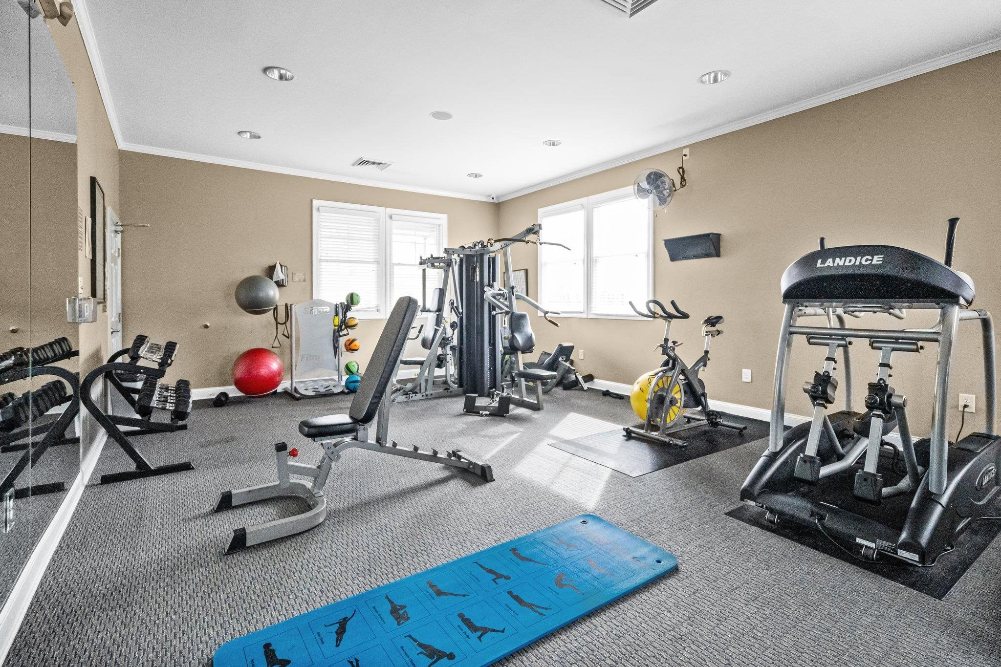 10109 Falls Meadow Court Raleigh, NC 27617 - Photo 34 of 37 a view of a room with gym equipment