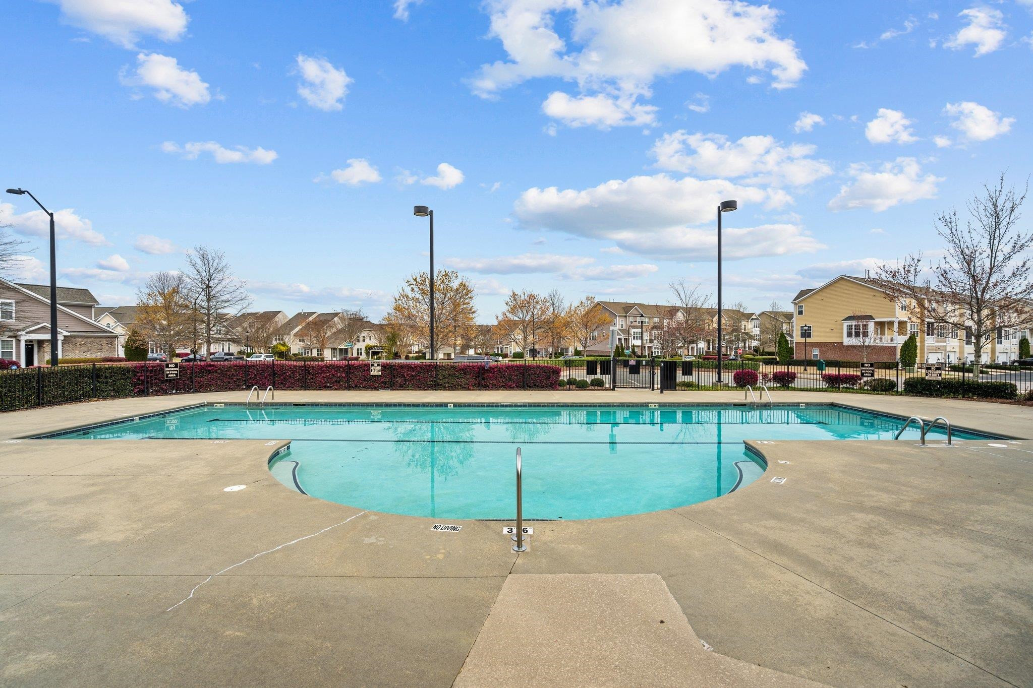 10109 Falls Meadow Court Raleigh, NC 27617 - Photo 36 of 37 a view of a lake with a terrace