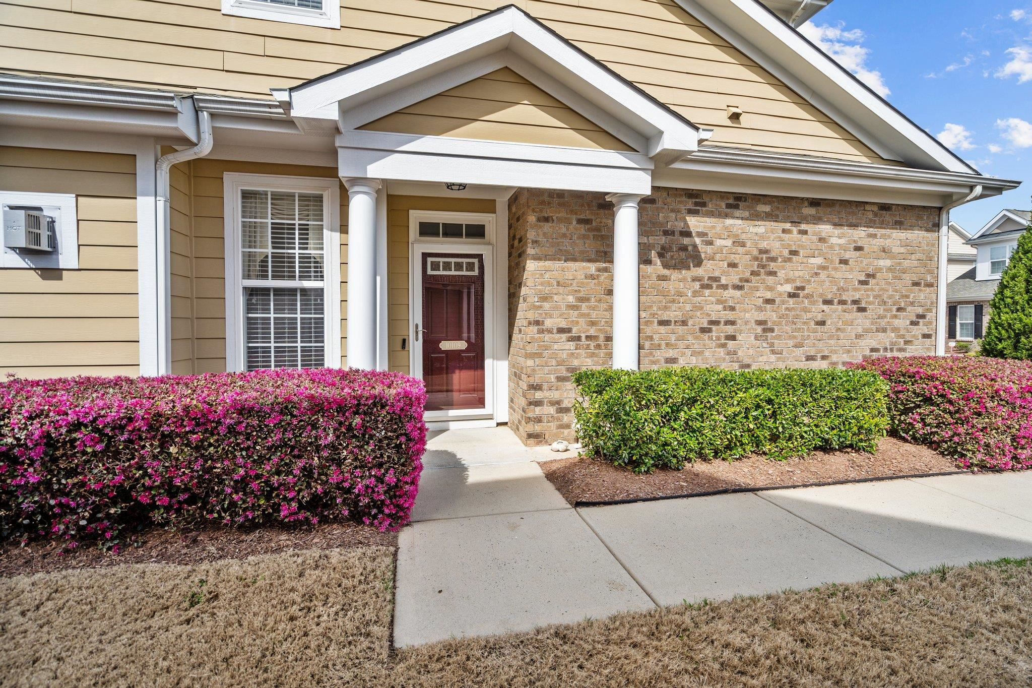 10109 Falls Meadow Court Raleigh, NC 27617 - Photo 4 of 37 a front view of a house