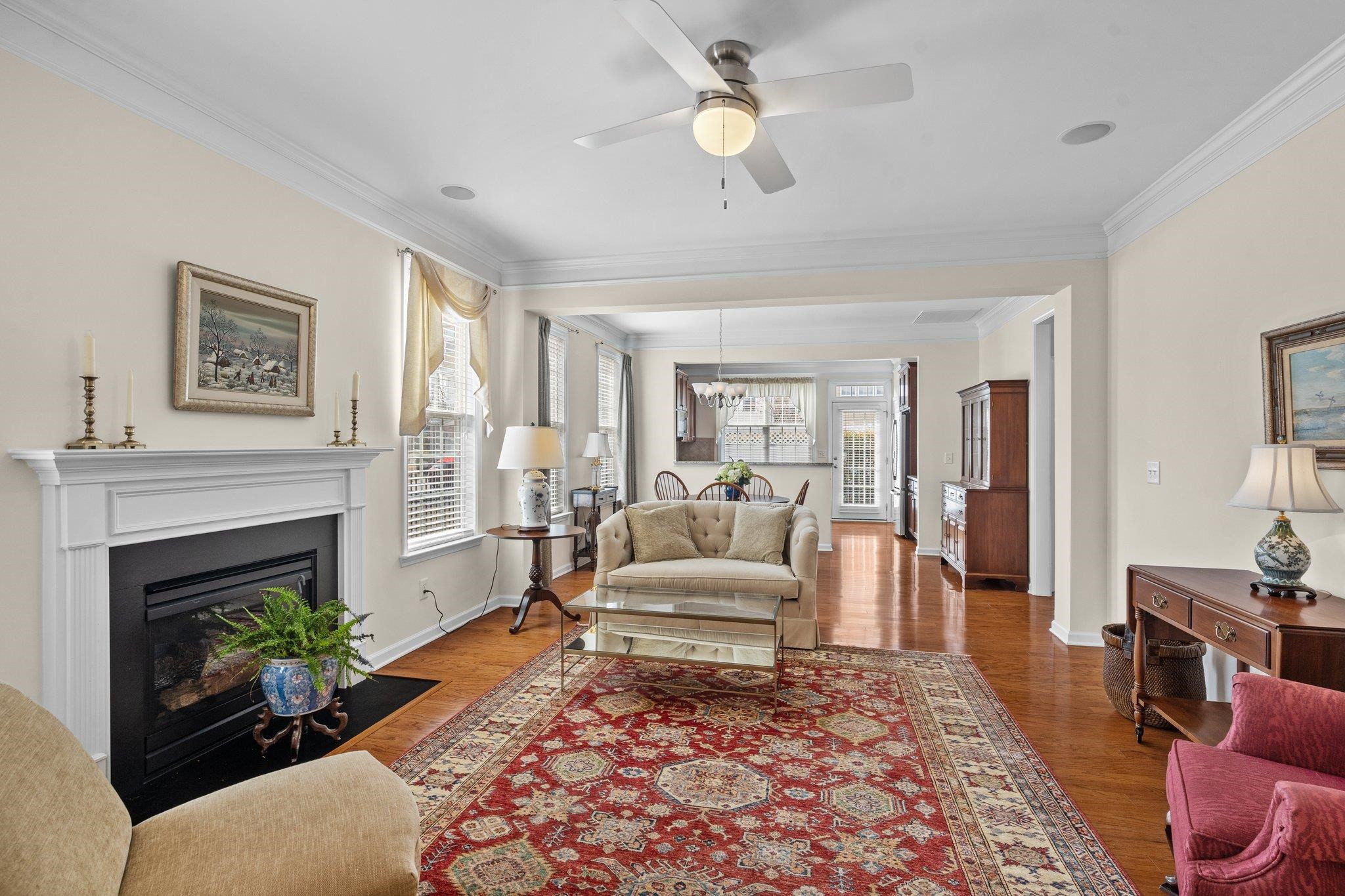 10109 Falls Meadow Court Raleigh, NC 27617 - Photo 6 of 37 a living room with furniture and a fireplace