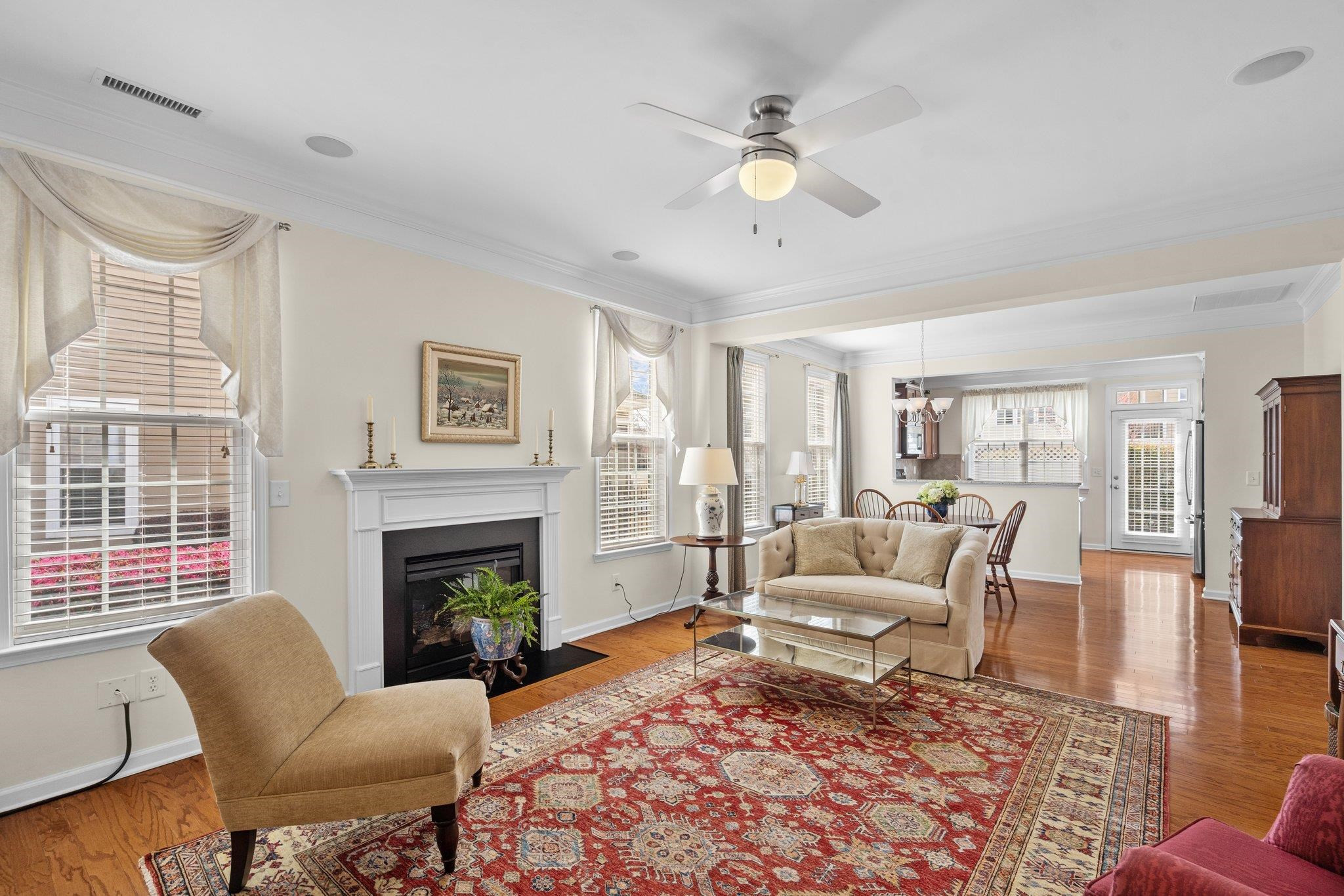10109 Falls Meadow Court Raleigh, NC 27617 - Photo 7 of 37 a living room with furniture and a fireplace
