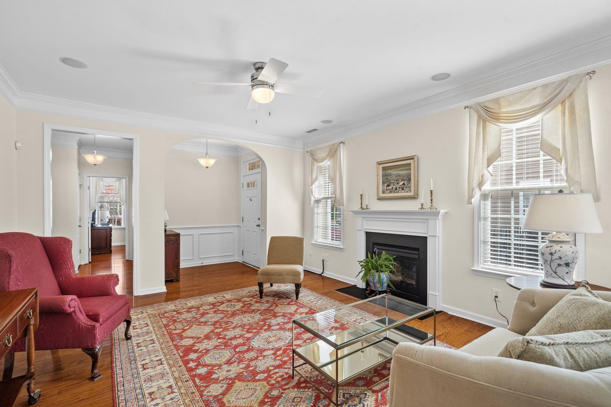 10109 Falls Meadow Court Raleigh, NC 27617 - Photo 8 of 37 a living room with furniture windows and a fireplace