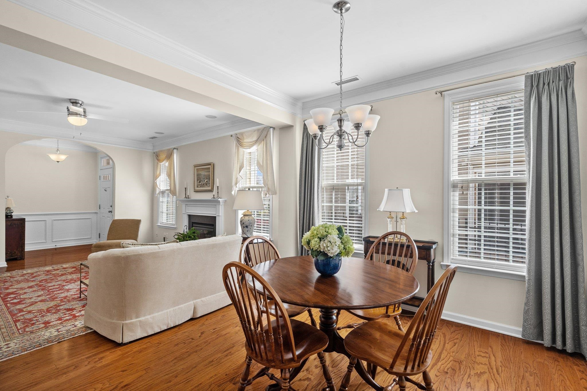 10109 Falls Meadow Court Raleigh, NC 27617 - Photo 9 of 37 a view of a dining room with furniture window and wooden floor