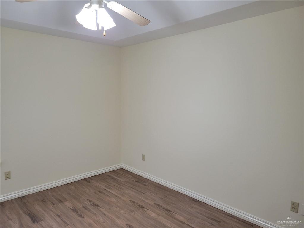 1605 Melissa Rae Drive Mission, TX 78572 - Photo 19 of 27 wooden floor in an empty room