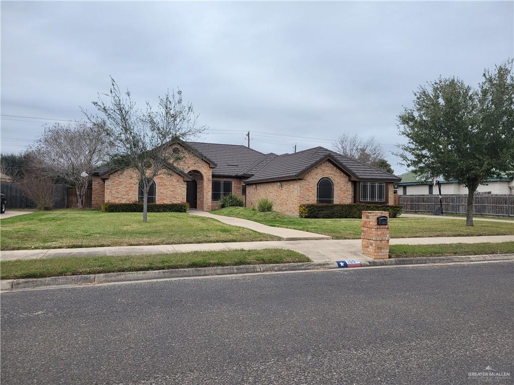 1605 Melissa Rae Drive Mission, TX 78572 - Photo 3 of 27 a house with trees in the background