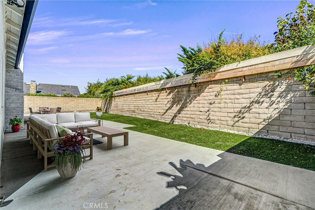 17472 Bellport Circle Huntington Beach, CA 92649 - Photo 19 of 23 a view of a terrace with furniture