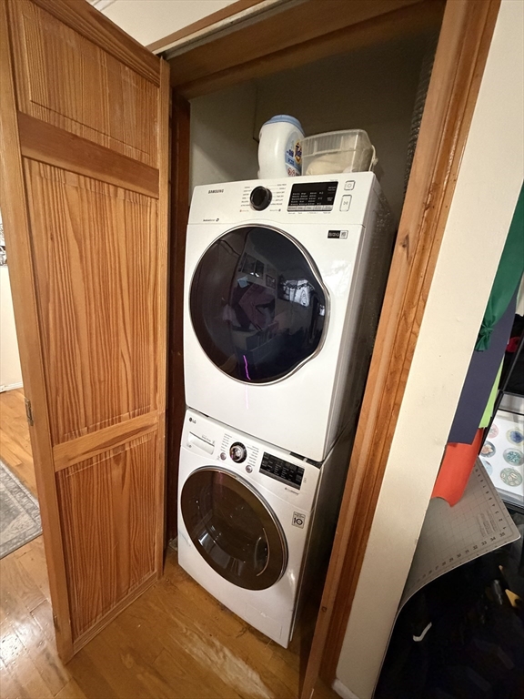 108 Perkins Street, Unit 4 Boston, MA 02130 - Photo 6 of 7 a utility room with dryer and washer
