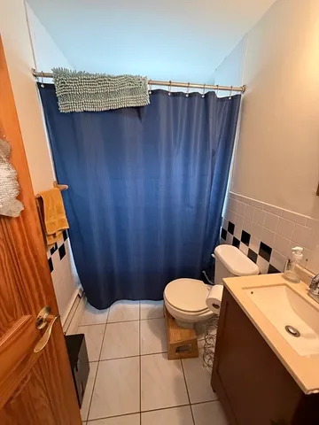 a bathroom with a sink and a toilet