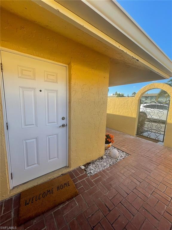 136 Harrison Road, Unit L3 Naples, FL 34112 - Photo 7 of 31 a view of a closet area