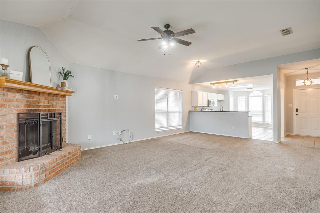 5712 Springtide Drive Fort Worth, TX 76135 - Photo 4 of 25 Updated ceiling fans and light fixtures