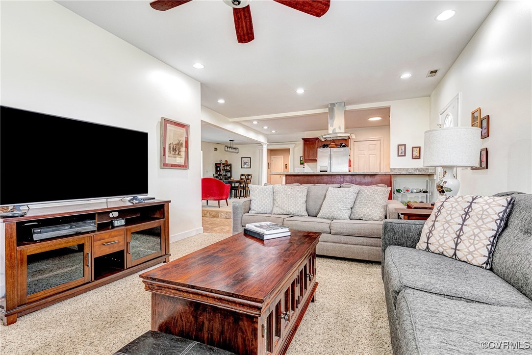 654 Bybee Road Louisa, VA 23093 - Photo 27 of 50 a living room with furniture and a flat screen tv